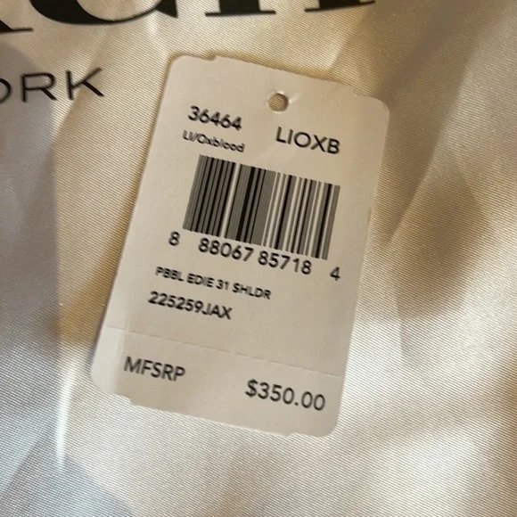 Coach Edie 31 Refined Pebble
Leather Shoulder Bag NWT in Oxblood w duster - Picture 9 of 9